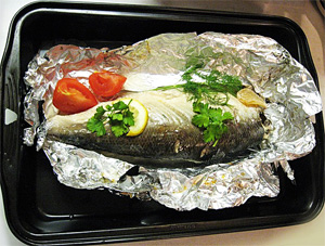 food cooking fish in foil 0