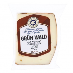 Сыр Грюн Вальд твердый с пажитником 45%