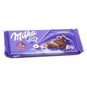 Шоколад Milka молочный с фундуком и изюмом