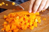 Шаг 3. Отварить морковь, порезать кубиками.